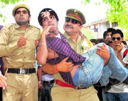 A scene from Gaurav Sharma directed street play Beware at Sector 17 Plaza on Tuesday