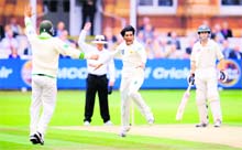 Mohammad Aamer celebrates after dismissing Shane Watson (not in picture) at Lord's on Tuesday. 