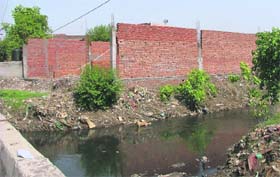The illegal building coming up along the Ganda Nullah, Ludhiana