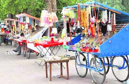 Stalls with items for the use of Kanwariyas being put up in Haridwar. The Kanwar season begins July 26. 