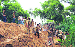 Volunteers of Green S Welfare involved in relief work near the Ghaggar banks in Sirsa.