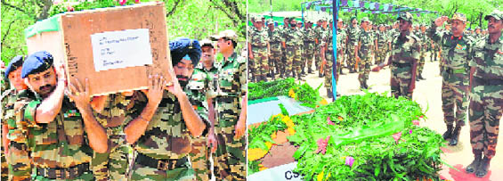 Army soldiers carry the coffin containing Major Amit Kumar Thenges body for the wreath-laying ceremony in Jammu on Thursday; and (right) the GOC, 16 Corps, Lieut-Gen Rameshwar, Roy pays homage.