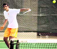 GP Prajnesh returns a shot during the HTA-AITA Mens semi-final at Jassowal in Jagraon on Thursday