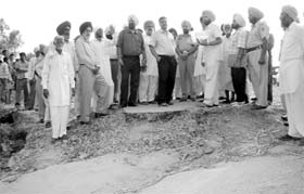 Chief Secretary SC Aggarwal and other officials visit flood-affected Arnetu village in Patiala district on Friday.