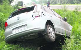A car that fell in a trench on the Chandigarh-Ambala highway at Dera Bassi.