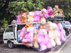 Soft toys on sale on a van outside the Gandhi Park in Dehradun on Friday.