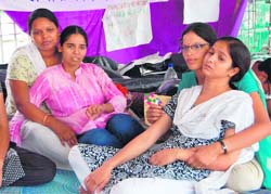 Jyoti and Rajni on an indefinite fast outside the Gandhi Park in Dehradun on Friday.