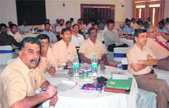 Defence scientists participate at a national seminar in Dehradun on Friday. 