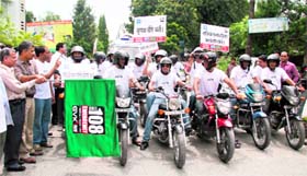 A motor cycle rally being flagged off in Dehradun on Friday.