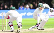 Pakistans Salman Butt is stumped by Tim Paine on Friday.