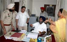 Deputy CM Sukhbir Badal and his MP wife Harsimrat Kaur Badal conducting a sudden raid late on Saturday evening at Civil Lines police station in Bathinda