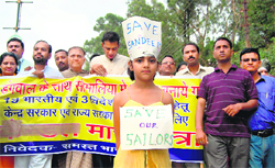 A rally being taken out to seek the release of local Merchant Navy officer Sandeep Dangwal in Dehradun