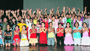 Kids perform during a summer camp at Abhinav theatre in Jammu on Saturday.