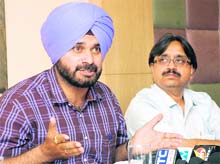 Navjot Singh Sidhu, BJP national secretary, addresses a press conference in Jalandhar. 