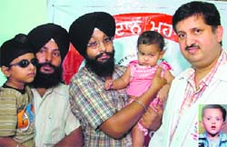 Amritpal (5) and Sukhnoor (11 months), who became the corneal recipients of Shivam (inset).