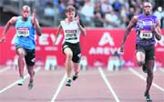 (From L) Jamaican Asafa Powell, French Christophe Lemaitre and Jamaican Usain Bolt compete in the mens 100m event of the Paris IAAF Diamond League meeting in Saint-Denis, near Paris, on Friday.