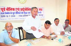 SS Pangati, former IAS officer, addresses a seminar organised by ex-servicemen in Dehradun on Sunday. 