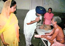 Deputy Chief Minister Sukhbir Singh Badal and his MP wife Harsimrat Kaur Badal carry out a check in Civil Hospital, Bathinda, on Saturday night. The Badals spoke to patients to assess the functioning of the doctors and scrutinised hospital records