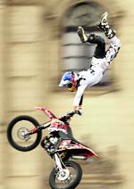 A motorcyclist performs during the Red Bull X-Fighters Jams motocross exhibition in Lima on Saturday