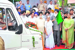 Punjab Chief Minister Parkash Singh Badal flags off one of the 39 ambulances at Mohali