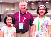 Tarini and Arunima Goyal pose with former world champion Anatoly Karpov during the Asian Youth Chess Championship in Beijing.