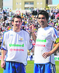 Argentina's soccer player Lionel Messi (Left), and the Brazilian-born Portugal midfielder Anderson Luis de Souza, better known as Deco, pose for pictures prior to a charity match organized by Deco in Indaiatuba, Brazil, on Sunday.