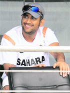 Indian captain MS Dhoni relaxes in the pavillion on Monday.