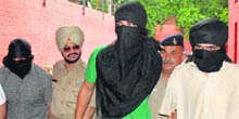 The accused in police custody at the Sector 36 police station on Tuesday. 