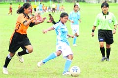 Players in action during a football match at Sector 12 in Chandigarhon Tuesday.