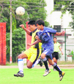 Players in action at the District Super League in Dehradun
