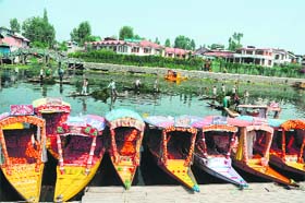 Shikaras at the Dal Lake in Srinagar wait for tourists