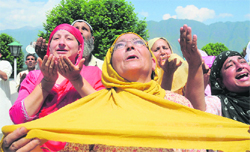 Women seek blessings during prayers at the Hazratbal shrine in Srinagar, which houses the holy relic of Prophet Mohammad.