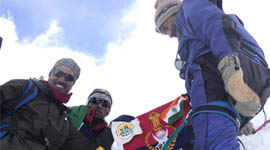 Punjab Police head constable Mohan Lal (extreme left) smiles after scaling Mount Ram Jakh peak in Lahaul valley of Himachal Pradesh.