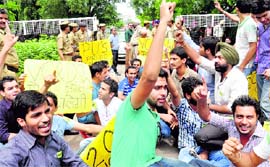 Members of students unions protest in front of the Vice-Chancellors office at Panjab University in 