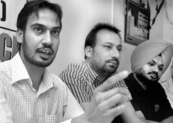 Members of the Punjab State Veterinary Doctors Association during a press conference at Phase IV in Mohali on Wedneday. A Tribune