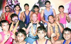 Wrestlers Kurt Angle, Mick Foley and Jay Lethal during a function at the Gulzar Wrestling Akhara in Zirakpur. 