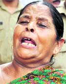 A woman, whose house was demolished in the drive, protests in Haridwar on Wednesday.