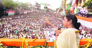 Raising a point: Trinamool Congress president Mamata Banerjee addresses a rally in Kolkata