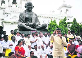 TDP chief Chandrababu Naidu addresses party members during a protest on the premises of Andhra Pradesh Assembly in Hyderabad