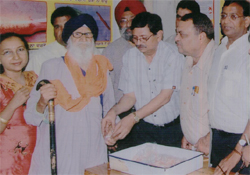 93-year-old Bali Singh from Talwandi Sabo receiving a set of dentures from health authorities at the Civil Hospital in Bathinda 