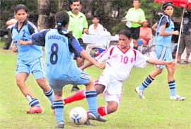 Orissa forward attempts a shot at goal against Maharashtra during their quarterfinal match of the Junior National Football Tournament at Sector 12, Chandigarh, on Thursday.