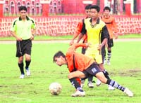 A match of the Dehradun Football League in progress at the Police Lines in Dehradun on Thursday.
