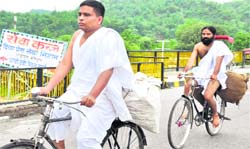 Swami Ramdev in a shot of a film on his life in Haridwar on Thursday.