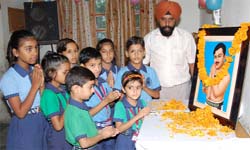 Kids join in paying floral tributes to Chandra Shekhar Azad on his birth anniversary in Abohar.