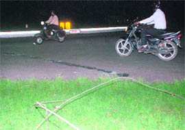 A motorcyclist had a narrow escape when an electricity wire fell on him on the road separating Sectors 36 and 37. Though he escaped unhurt, the bike caught fire.