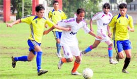 A match in the Dehradun Football League being played at the Police Lines ground in Dehradun on Friday.