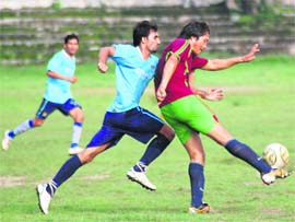 A match in the Nemi Dass Memorial Football League in progress at the Pavilion Grounds in Dehradun on Friday.
