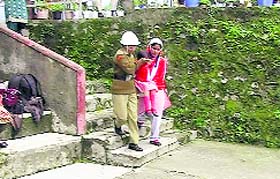 A mock drill on disaster rescue techniques being conducted at Mussoorie Girls School on Thursday.
