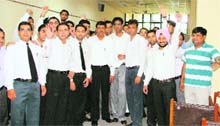 Lawyers hold a protest against the police for detaining their colleague, at the district courts complex in Ludhiana on Friday. 