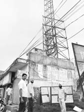 A mobile phone tower intalled atop a government building at Kharar.
